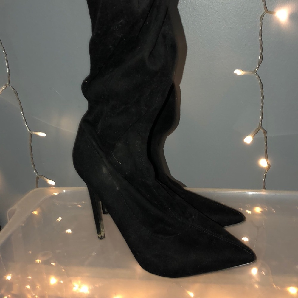 black thigh high boots